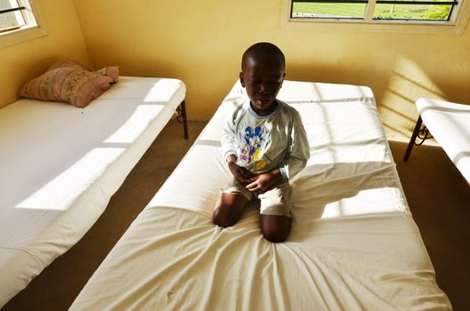 Malindi,Kenya- 16 October 2011:  a child unidentified orphan in college Rizzato the Italian association that collects the children from the streets in Malindi, Kenya October  16, 2011