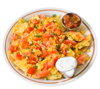 A plate of nachos and cheese, isolated on a white background.