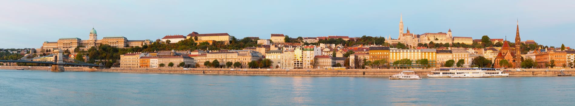 Old Budapest overview as seen from Danube river bank early in the morning