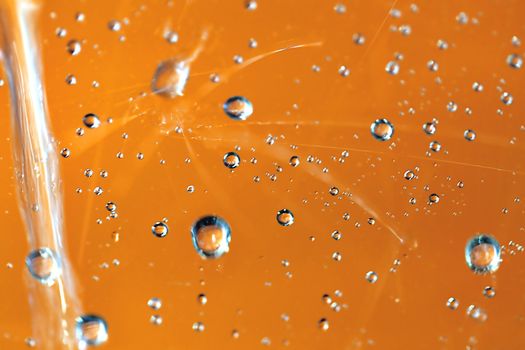 Macro picture of water droplets on window, shallow DOF