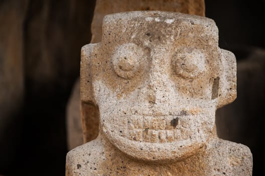 A closeup view of an ancient pre-columbian statue in San Agustin, Colombia.