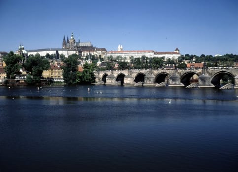 View of river Vltava and Prague Castle with Charles Bridge in Prague, Czech Republic