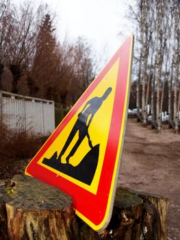 Warning sign, triangle, construction work, road being constructed