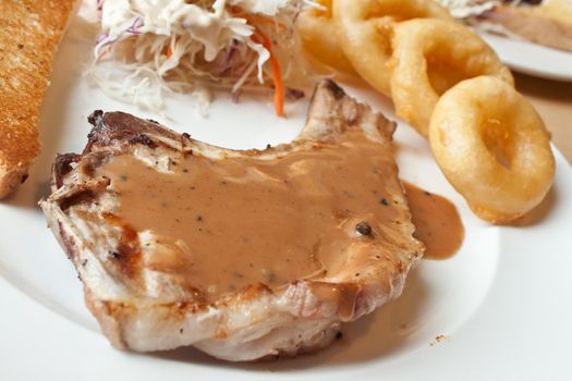 Black pepper steak in plate, shallow depth of field