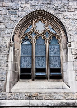 An old church window showing much detail and texture