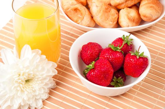 Breakfast with berries,orange juice and croissant, early breakfast