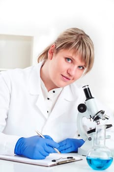 female doctor working in the lab, doing research