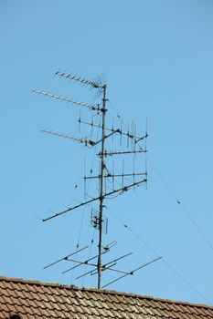 Old aerials on a rooftop