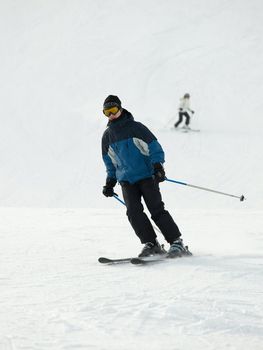 Skier coming down the slope