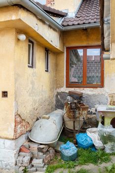 rural scene with old house and disorder