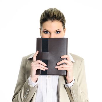 pretty buisnesswoman hiding behind a diary