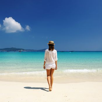 Woman in hat at beach