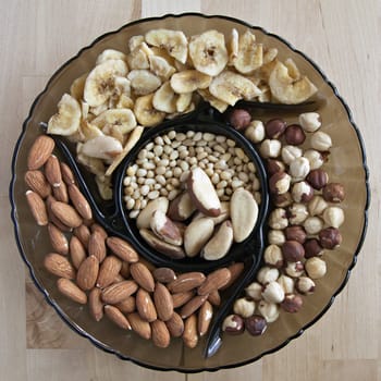 Glass plate with different kinds of nuts
