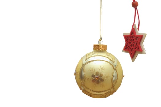 very old yellow christmas bauble isolated over white background