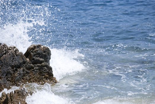 wave splashing on a rock on the Croatian sea