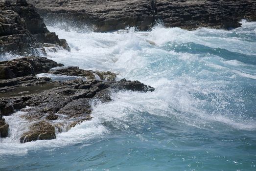 waves breaking on the shore