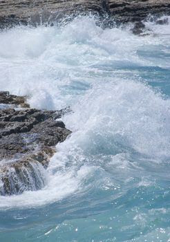 waves breaking on the shore