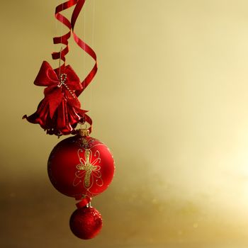  red christmas balls on gold  background