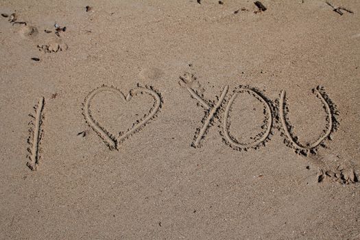 I love you hand-written in the sand
