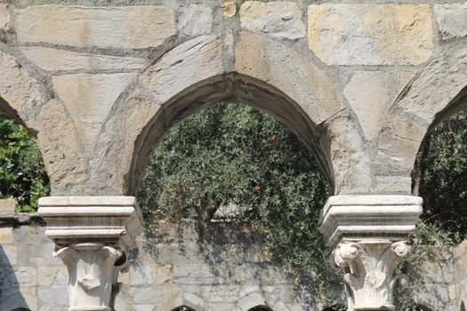 Detail of 12th century arcade in Genoa, Italy
