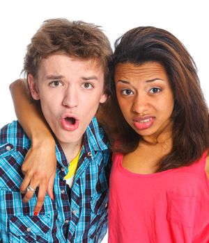 Clouse-up portrait emotional young man with pretty girlfriend. Isolated on white background.