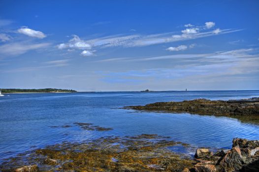 Blue skies over the lighthouse at Portsmouth