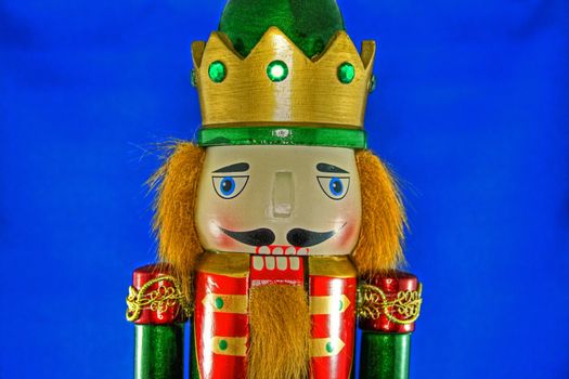 Close up view of Nutcracker on blue background