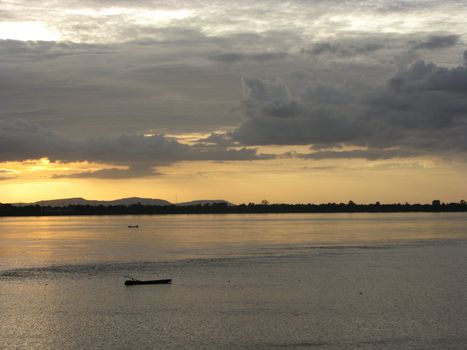 Boat on river at dawn