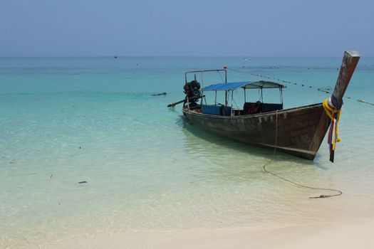 Long tail boat by the beach