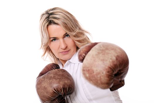 Woman with boxing gloves over white background