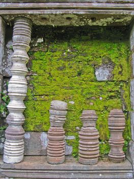 Stone window of temple in Vat Phou, Laos