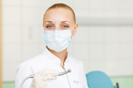 A portrait of a dental worker, dentist or assistant