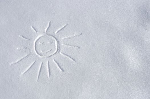 picture of the smiling sun on the fresh white snow