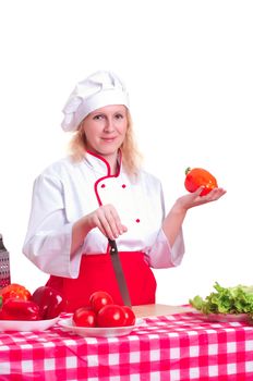 Portrait of attractive cook woman, holding a knife