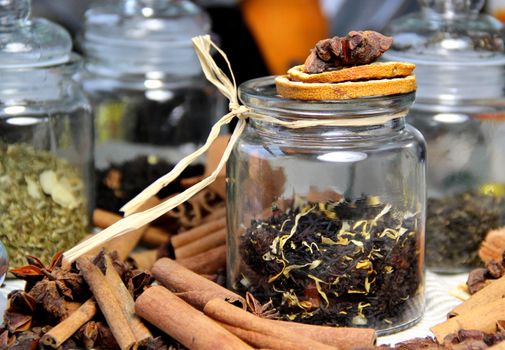 Tea, cinnamon sticks and dry orange