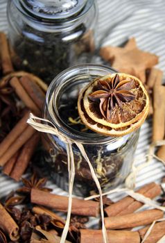 Tea, cinnamon sticks and dry orange
