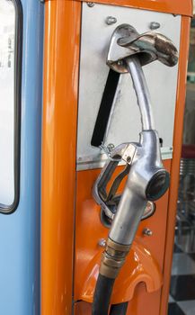 Vintage refuel hose on retro gas station
