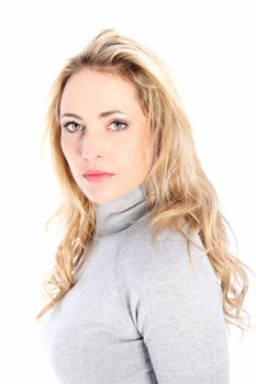 Studio shot of serious blonde woman on white background