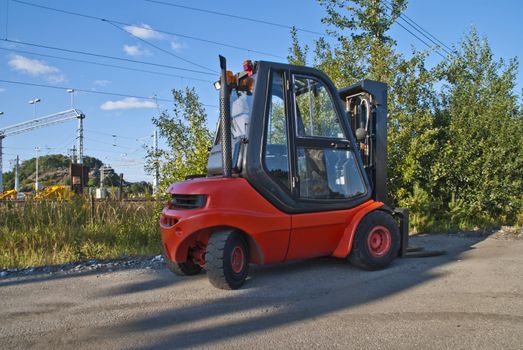at the freight terminal to halden railway station operating this fork lift truck