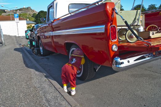 each wednesday during the summer months there is a display of american vintage cars in the center of halden city.