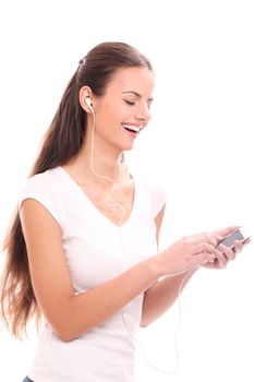 Attractive woman listen music with headphones isolated on a white