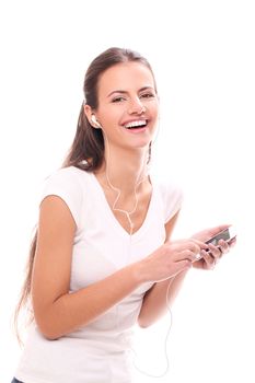 Attractive woman listen music with headphones isolated on a white