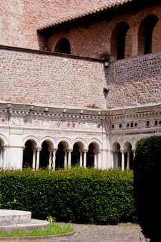 A small garden in the inner yard in archbasilica os St. John Lateran in Rome
