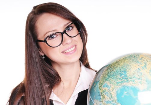 Pretty young teacher with globe over white background