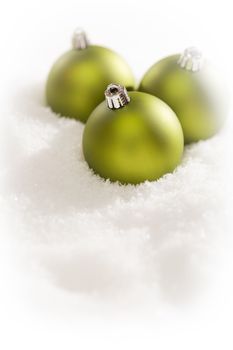 Beautiful Matt Green Christmas Ornaments on Snow Flakes Room For Your Own Text.