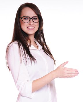 Portrait of a happy young woman offering a handshake against white background
