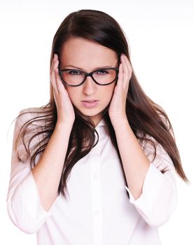 Portrait of a young businesswoman experiencing a headache. Isolated on white background