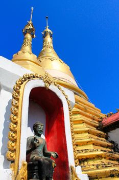 copper statue of a Buddha in Thailand.