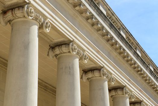 Stone Support Pillars with Blue Sky Background