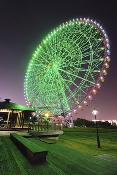 scenic night illumination of big ferris wheel 